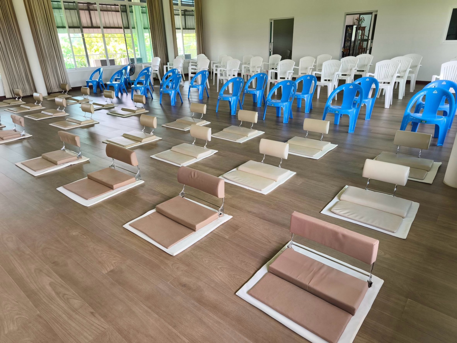 Floor cushions laid out in the hall
